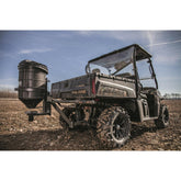 Handheld controller for seed and fertilizer dispense settings on the ATV spreader